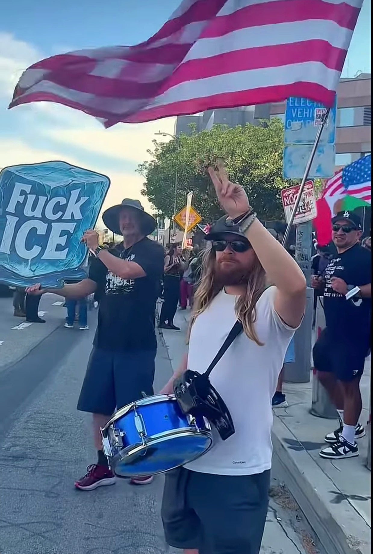 Custom-cut corrugated plastic ICE protest sign detail